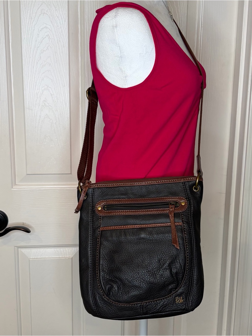 The Sak Black Pebbled Leather Shoulder Bag with Brown Trim